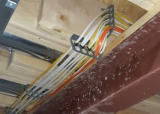 Using the Cable Chase instead of drilling holes will greatly reduce the damage to floor joists, LVLs and manufactured wood. 