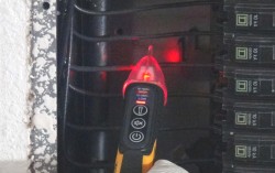 Flashing Red LED and Audible Tone indicates presence of Voltage