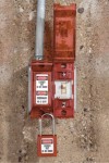 Locks out both toggle and Decora type switches