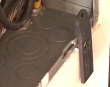 Place the panel buddy on the edge of the panel in front of knockout to be removed.
